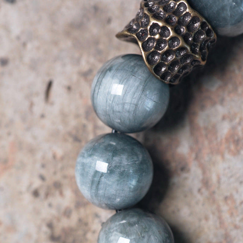 Bracelet de couple en cuivre et bois d'ébène avec pierre œil d'aigle et Buddha Stones