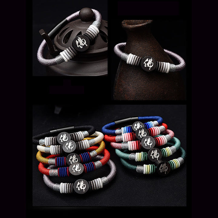 Bracelet en corde fait main en ébène avec personnage de Bouddha de Buddha Stones