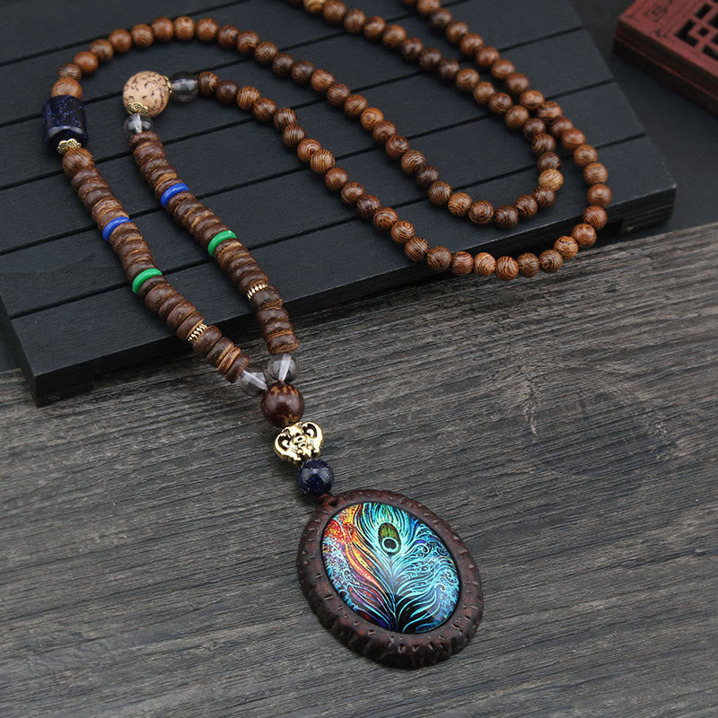 Collier pendentif protection éléphant en Buddha Stones tibétain en bois de wengé Bodhi Seed Agate