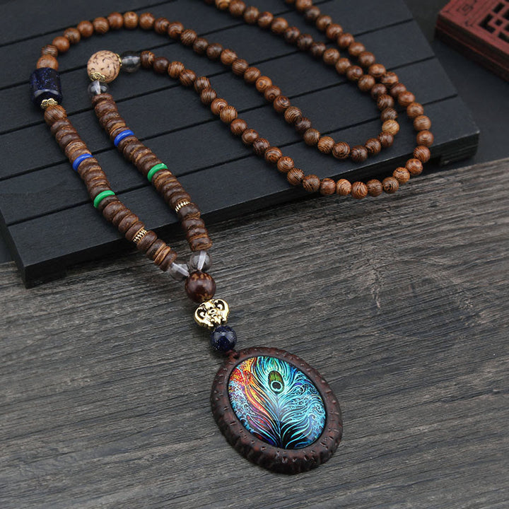 Collier pendentif protection éléphant en Buddha Stones tibétain en bois de wengé Bodhi Seed Agate