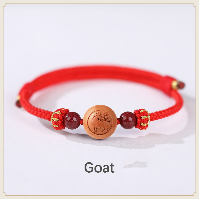Bracelet de richesse en bois de pêche naturel Buddha Stones et caractère Fu du zodiaque chinois sculpté en cinabre