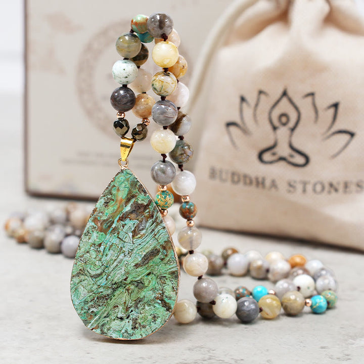 Collier de guérison en perles de jaspe Picasso naturel de l'océan Buddha Stones