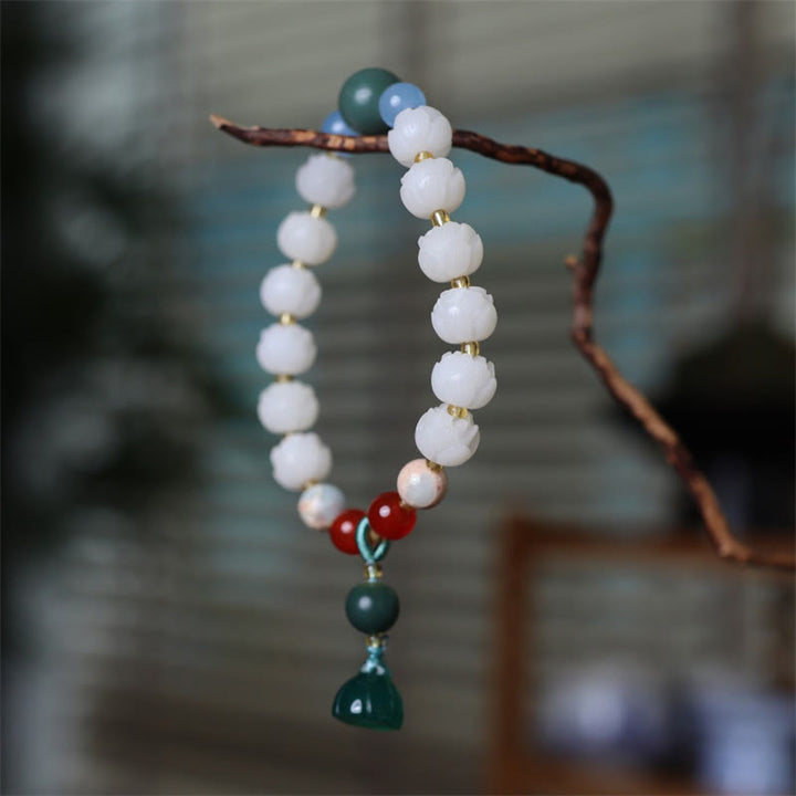Bracelet de paix et d'harmonie sculpté en perles de lotus et graines de Bodhi en Buddha Stones