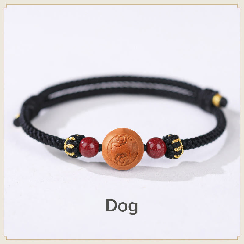 Bracelet de richesse en bois de pêche naturel Buddha Stones et caractère Fu du zodiaque chinois sculpté en cinabre