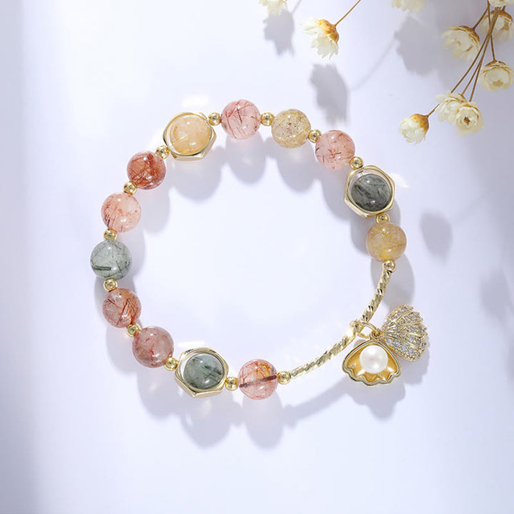 Bracelet de perles de protection en coquillage de quartz rutile coloré naturel de Buddha Stones