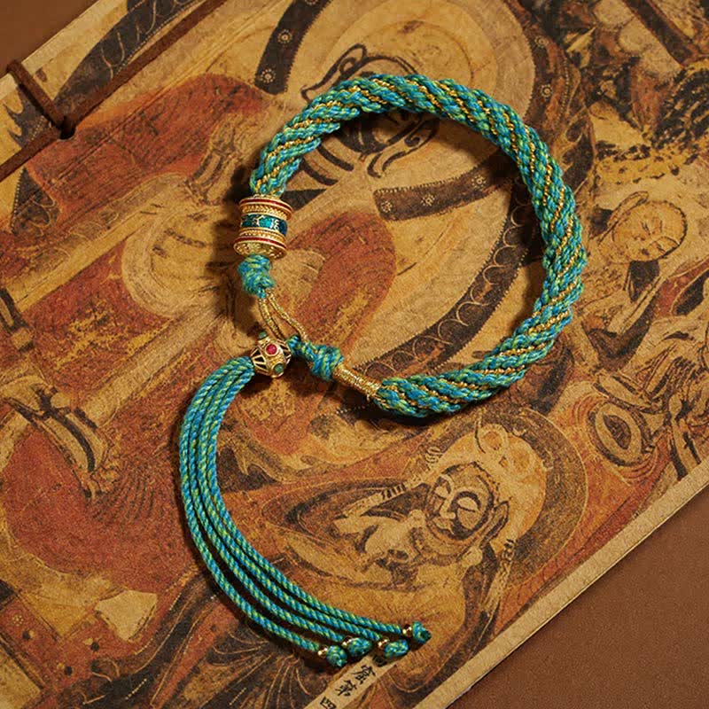 Bracelet tibétain en corde tressée avec breloque porte-bonheur Thangka en Buddha Stones