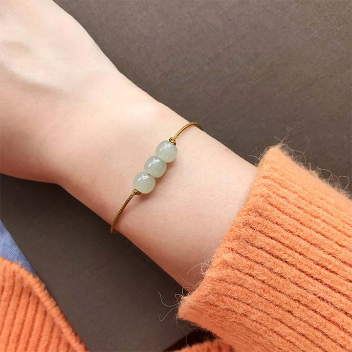 Bracelet tissé en fil de jade à trois perles de Buddha Stones