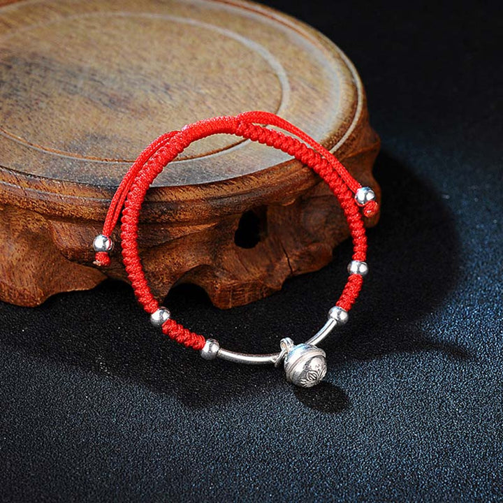 Bracelet Feng Shui porte-bonheur avec clochette rouge et Buddha Stones