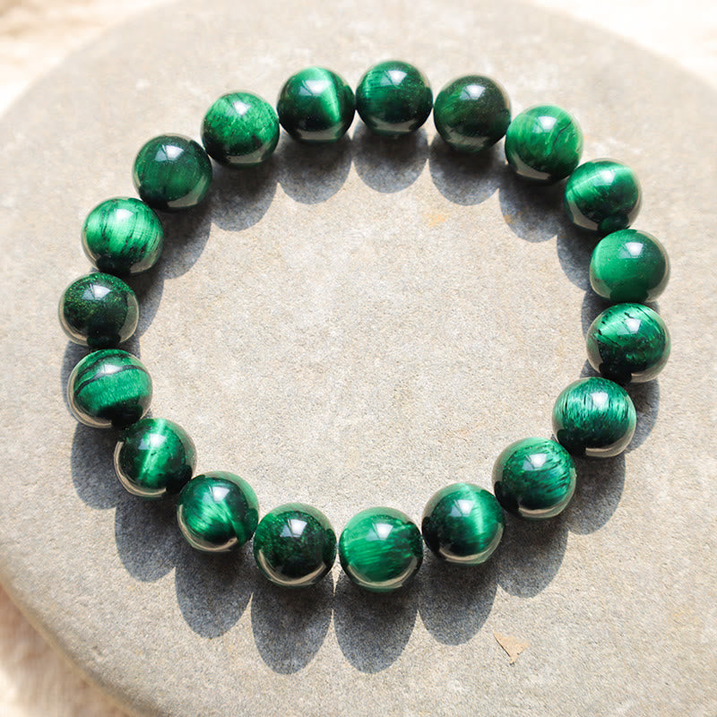 Bracelet énergétique de guérison et de croissance en œil de tigre Buddha Stones