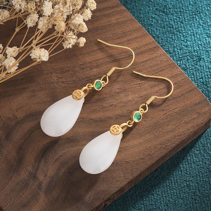 Boucles d'oreilles pendantes porte-bonheur en jade blanc Feng Shui Buddha Stones