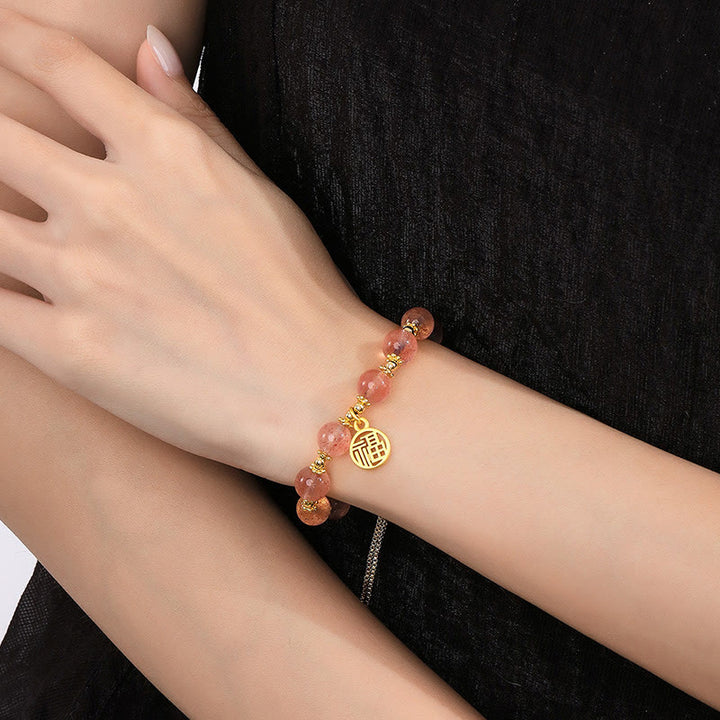 Bracelet à breloques positives en quartz fraise naturel plaqué or 14 carats de Buddha Stones