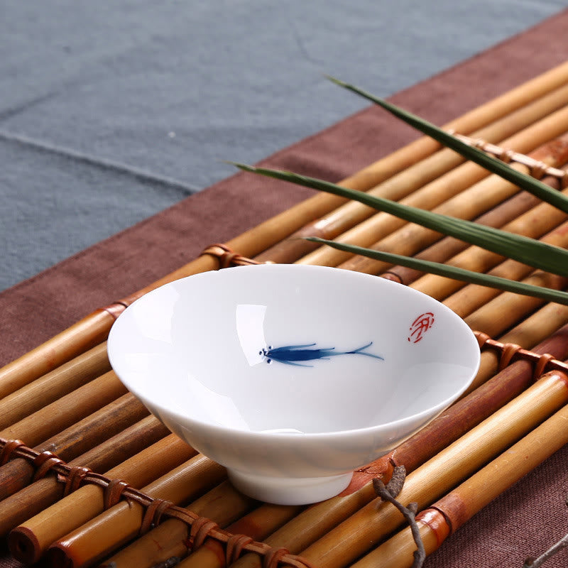 Tasse à thé en céramique de poisson koï en porcelaine bleue et blanche de Jingdezhen Buddha Stones