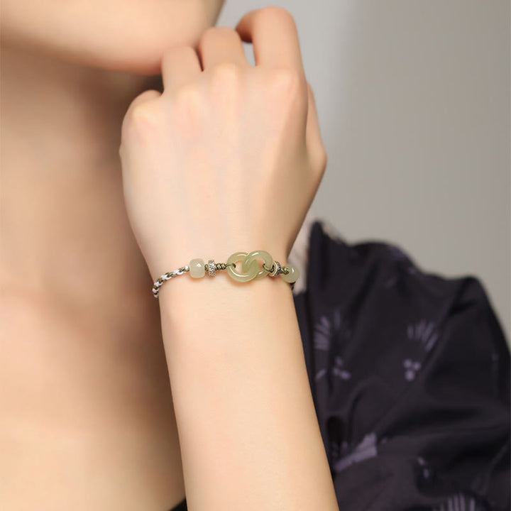 Bracelet tressé avec boucle de paix et porte-bonheur en jade naturel Hetian de Buddha Stones