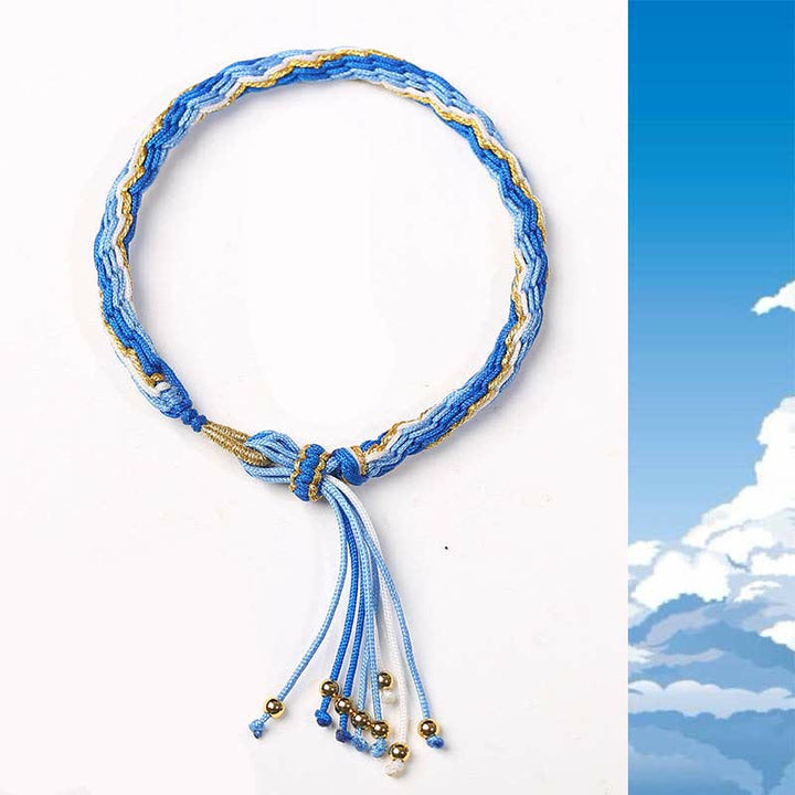 Bracelet tressé de protection avec cordon porte-bonheur et nœud de réincarnation