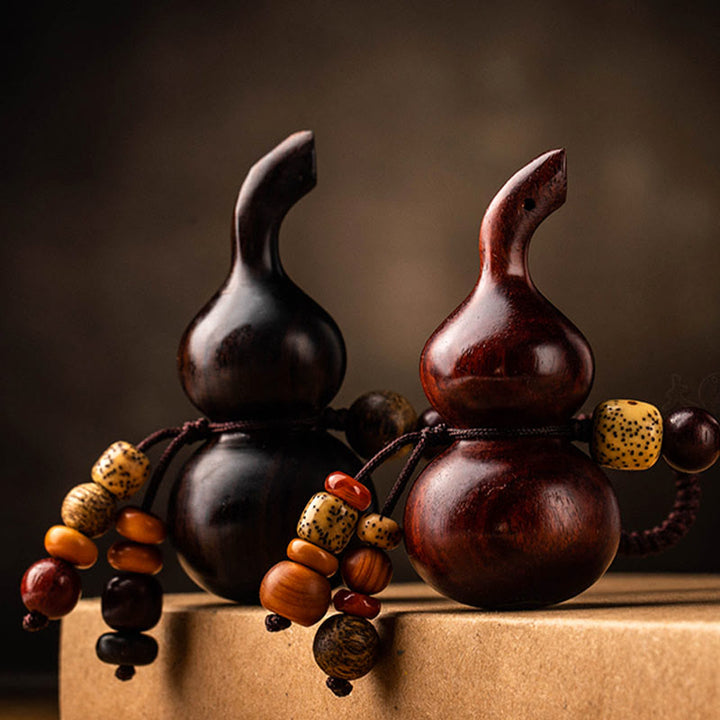 Porte-clés porte-bonheur en ébène tibétain à petites feuilles de gourde en bois de santal rouge