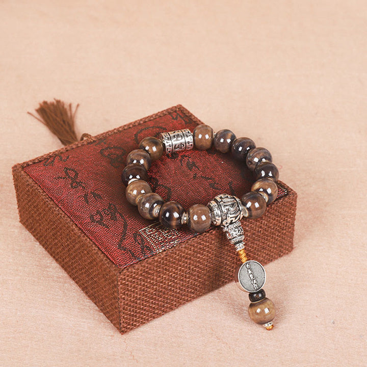 Bracelet de sagesse en perles de verre gravées Buddha Stones et roue de prières tibétaines Om Mani Padme Hum Dorje Vajra