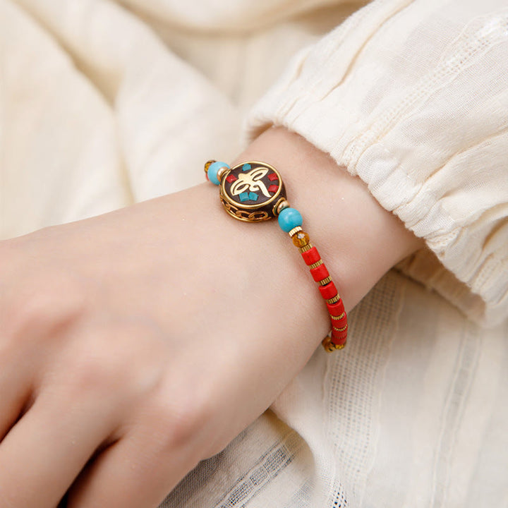 Bracelet de force de protection Om Mani Padme Hum en Buddha Stones tibétaines turquoise