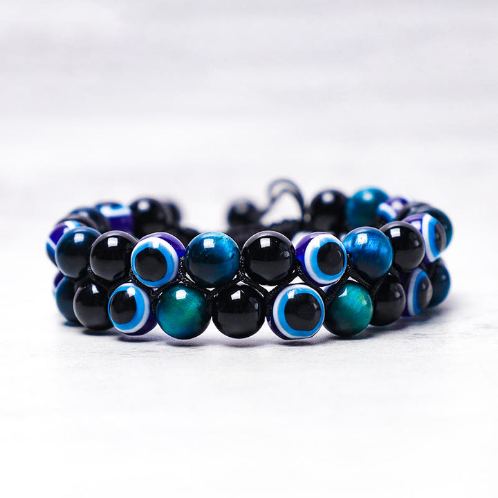 Bracelet de perles de protection contre le mauvais œil en hématite et œil de tigre Buddha Stones