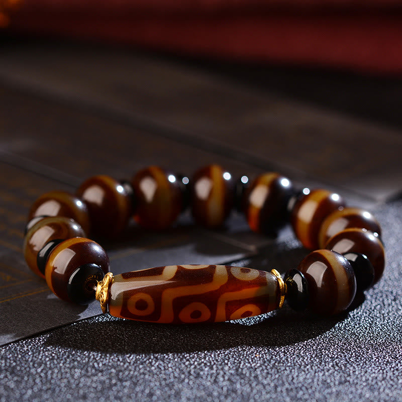 Bracelet tibétain en agate naturelle à neuf yeux avec perles dzi et Buddha Stones