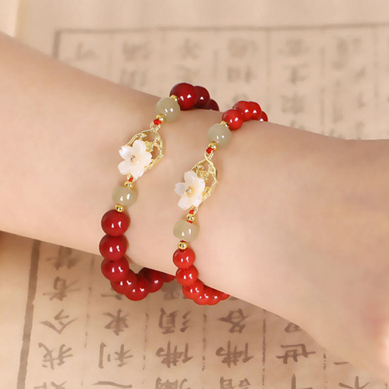 Bracelet de bénédiction en pierre de cinabre naturelle et jade Tridacna avec Buddha Stones