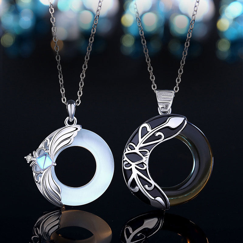 Collier pendentif porte-bonheur en cuivre avec ailes d'amour