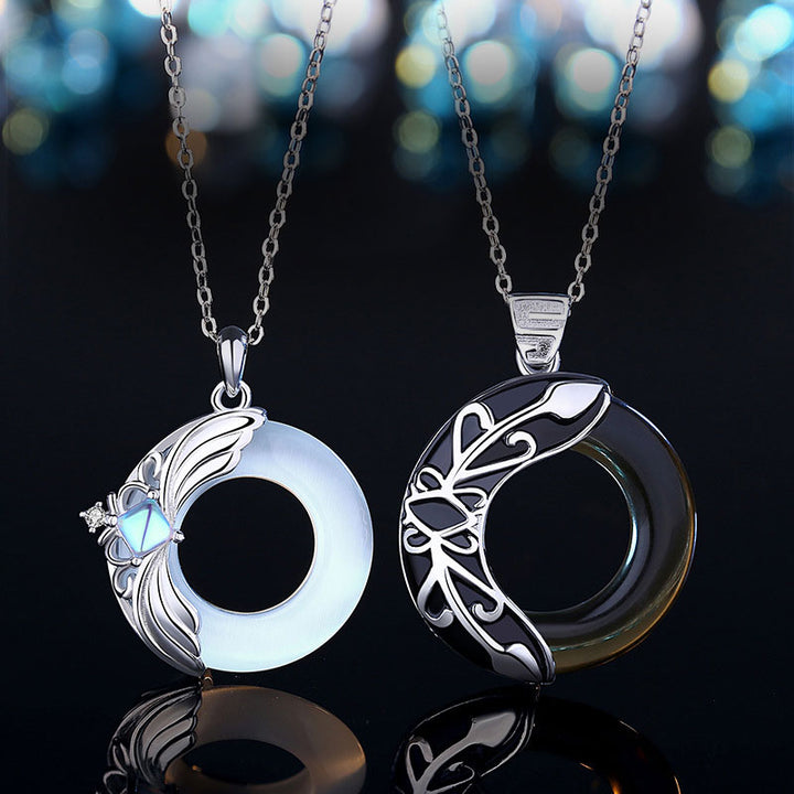 Collier pendentif porte-bonheur en cuivre avec ailes d'amour
