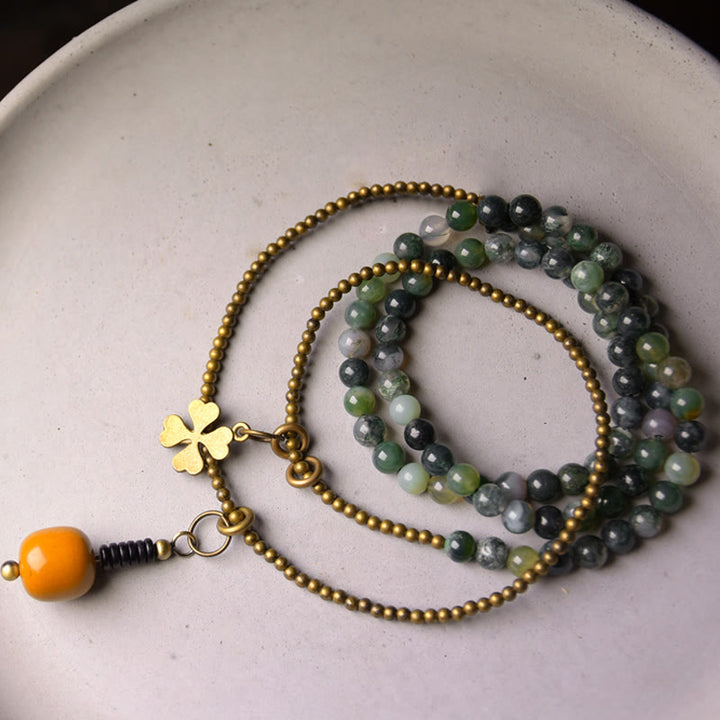 Bracelet porte-bonheur multicouche en cuivre et agate mousse avec Buddha Stones