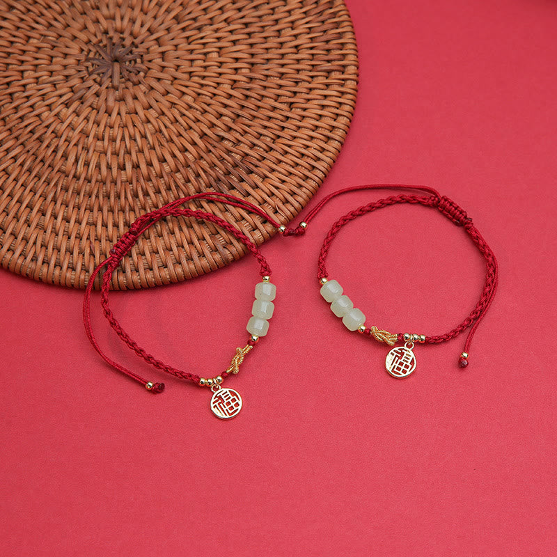 Bracelet porte-bonheur en corde rouge avec perles de jade fabriquées à la main par Buddha Stones