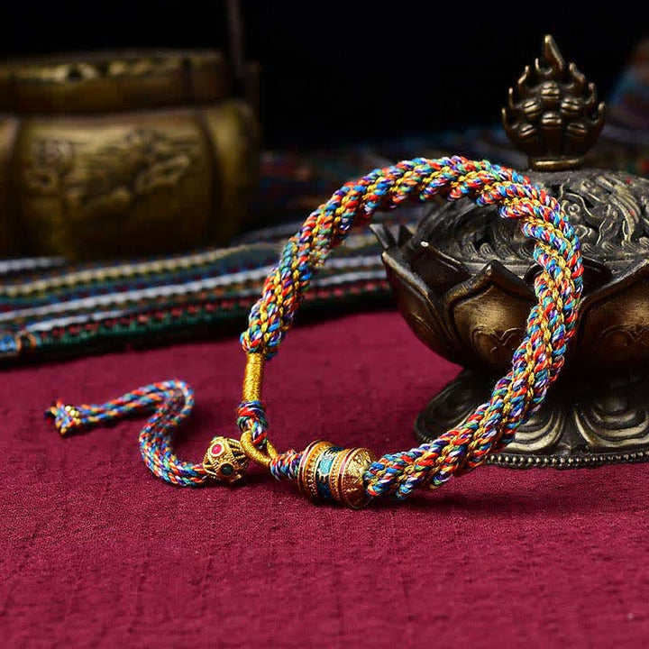 Bracelet tibétain en corde tressée avec breloque porte-bonheur Thangka en Buddha Stones