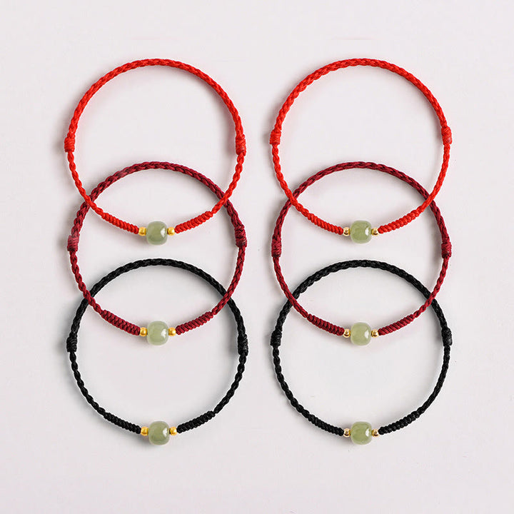 Bracelet tressé en perles de jade porte-bonheur et prospérité fait main avec Buddha Stones