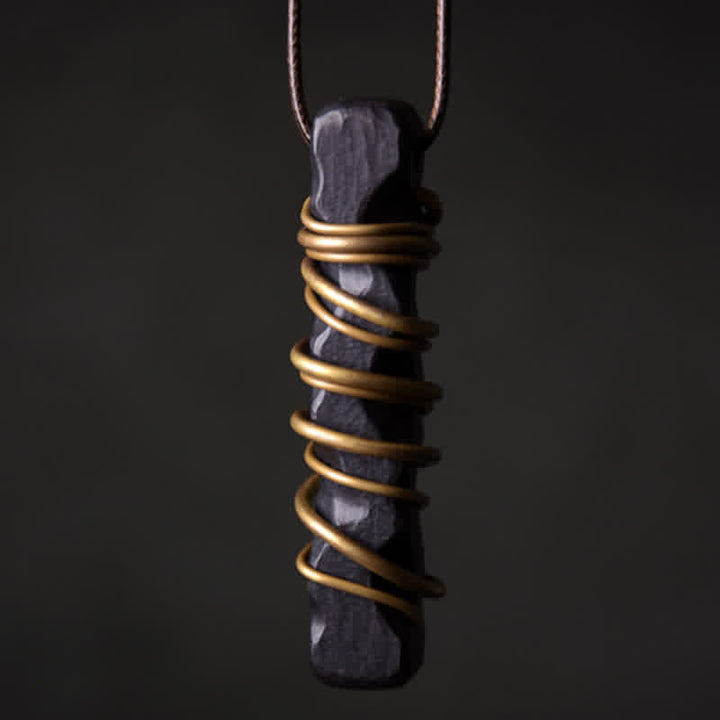 Collier pendentif en Buddha Stones en bois d'ébène du Tibet et en cuivre pour équilibre et paix - image 1