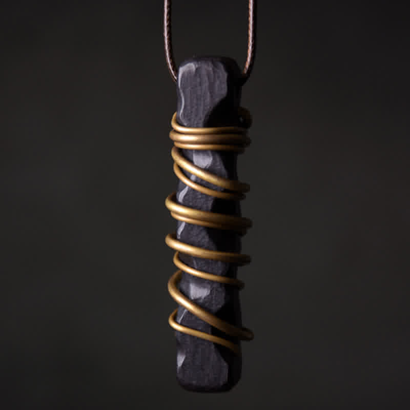 Collier pendentif en Buddha Stones, bois d'ébène du Tibet et laiton, symbole d'équilibre et de paix. - image 0