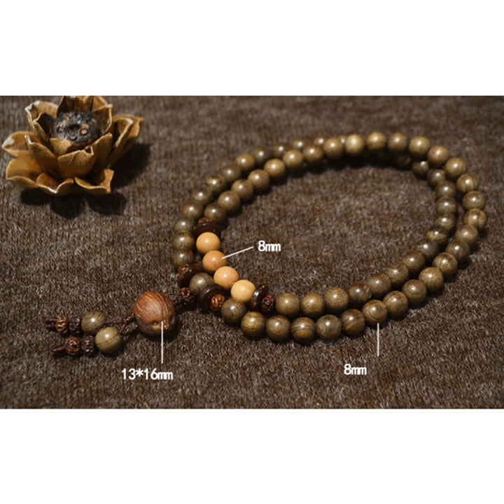 Bracelet Mala avec breloque de protection en bois de santal tibétain et Buddha Stones