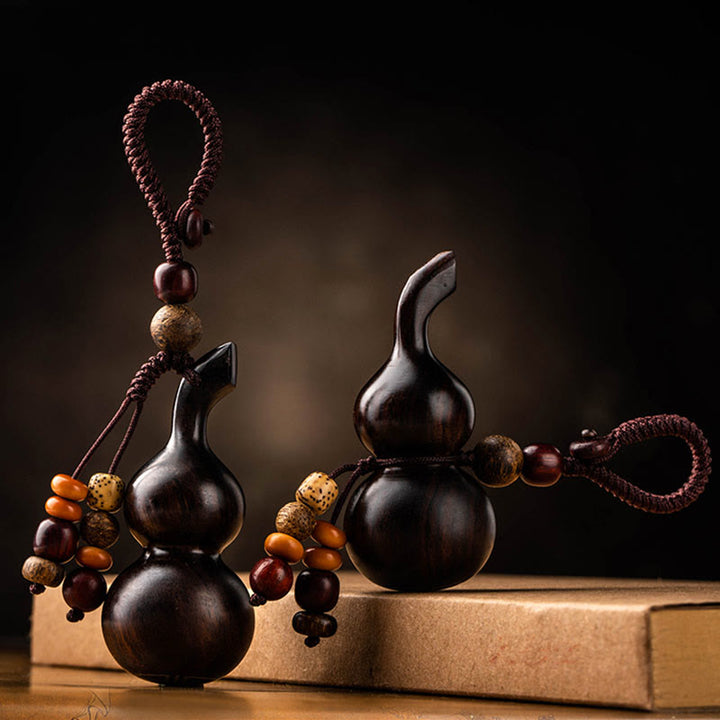 Porte-clés porte-bonheur en ébène tibétain à petites feuilles de gourde en bois de santal rouge