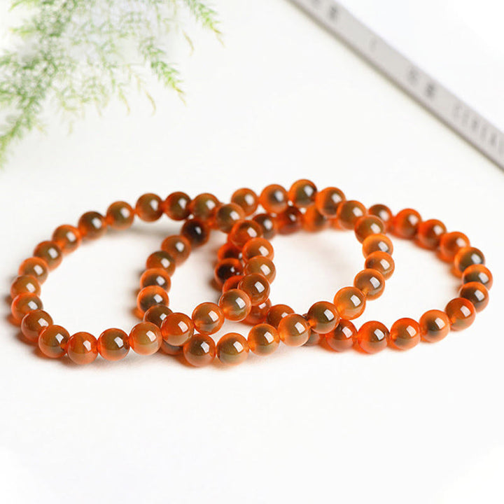 Bracelet de perles en agate naturelle colorée de Buddha Stones Harmony Strength