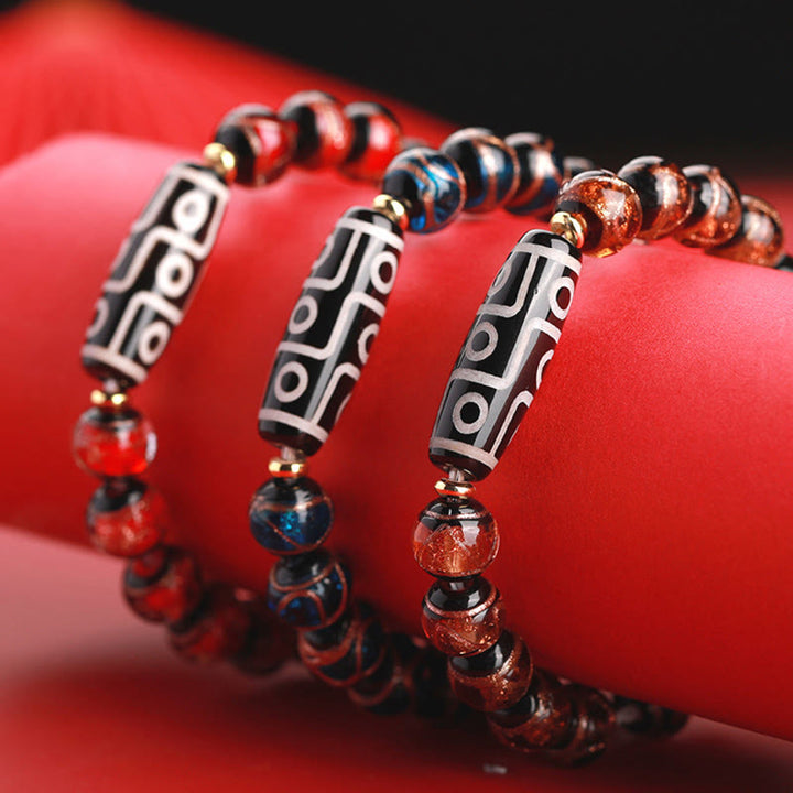 Buddha Stones Perle Dzi tibétaine à neuf yeux Perle Dzi à trois yeux Bracelet de richesse en perles de verre Liuli