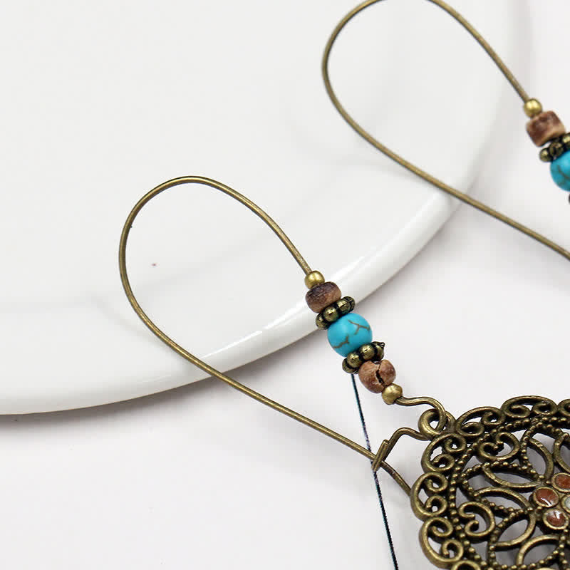 Boucles d'oreilles pendantes porte-bonheur à motif de fleurs rondes