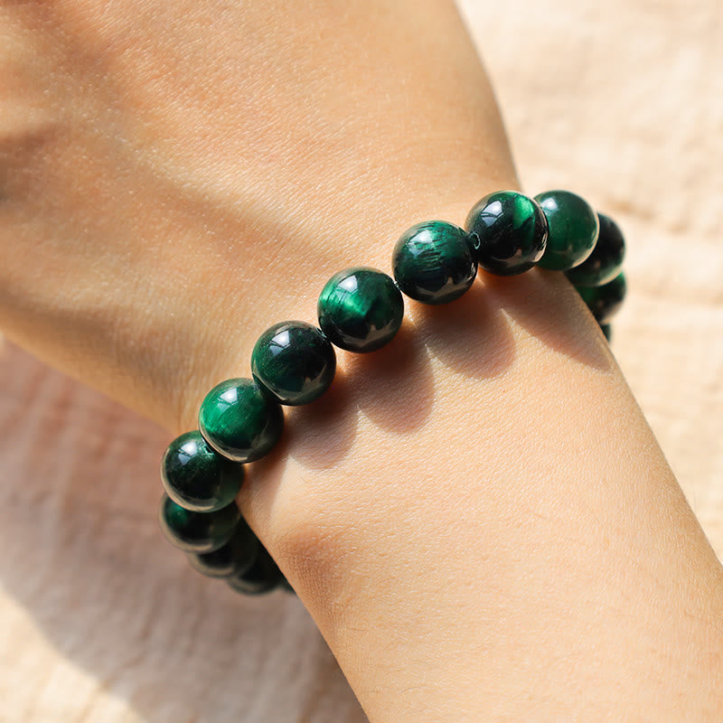 Bracelet énergétique de guérison et de croissance en œil de tigre Buddha Stones
