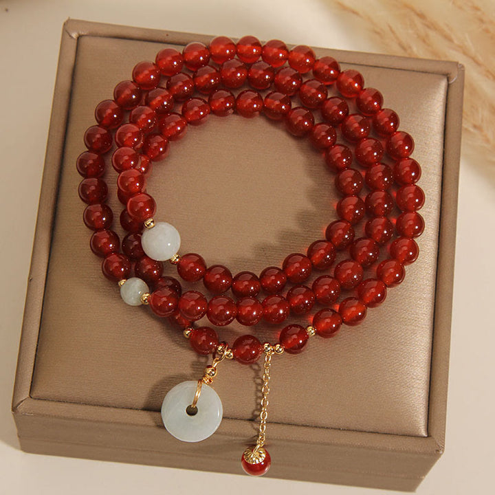 Bracelet triple tour en agate rouge naturelle et jade avec boucle de paix et calme en Buddha Stones