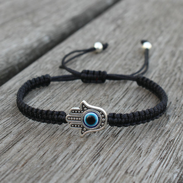 Bracelet en corde fait main avec symbole Hamsa et Buddha Stones