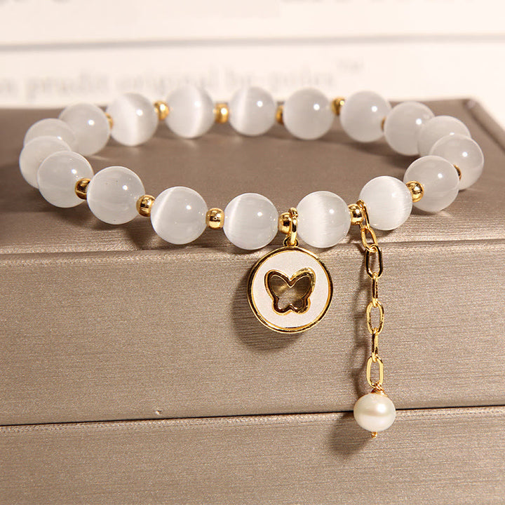 Bracelet d'amour avec breloque papillon œil de chat et Buddha Stones