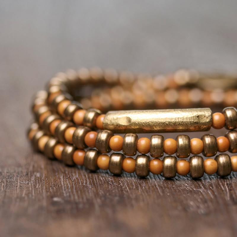 Bracelet de richesse rétro en cuivre avec noyau d'olive et Buddha Stones