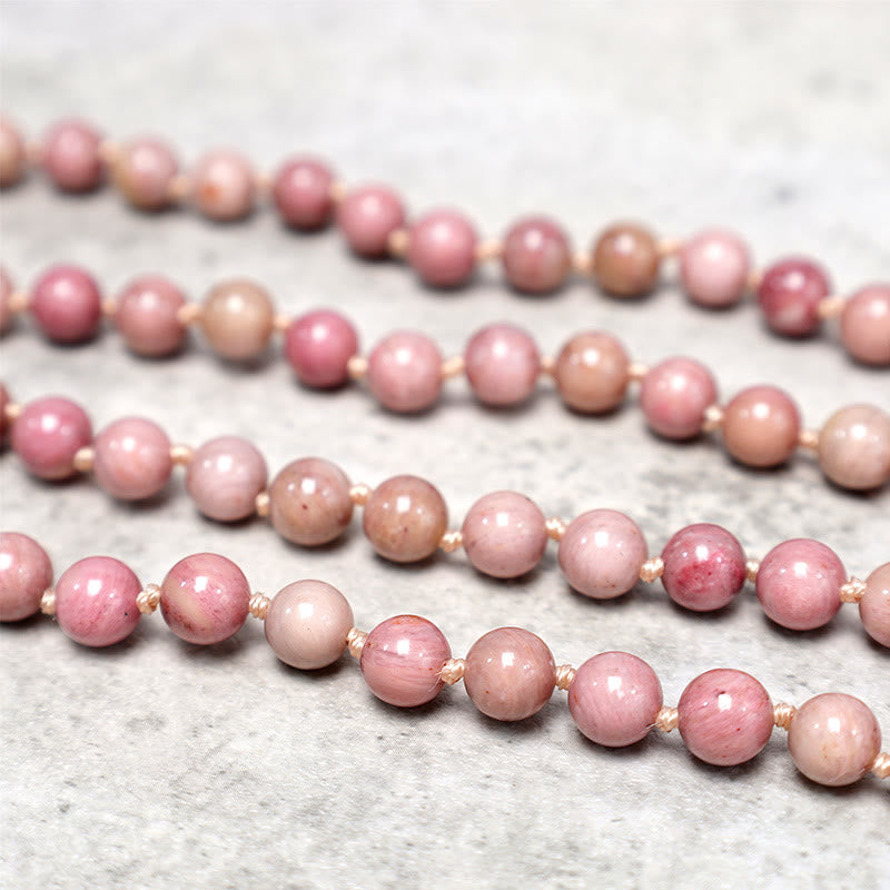 Bracelet de prière de méditation et de yoga en perles de rhodonite de 108 Mala Buddha Stones