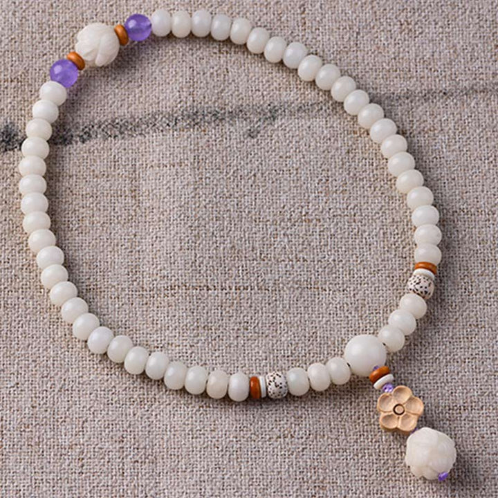 Bracelet de bénédiction Bodhi Lotus en jade blanc tibétain Buddha Stones