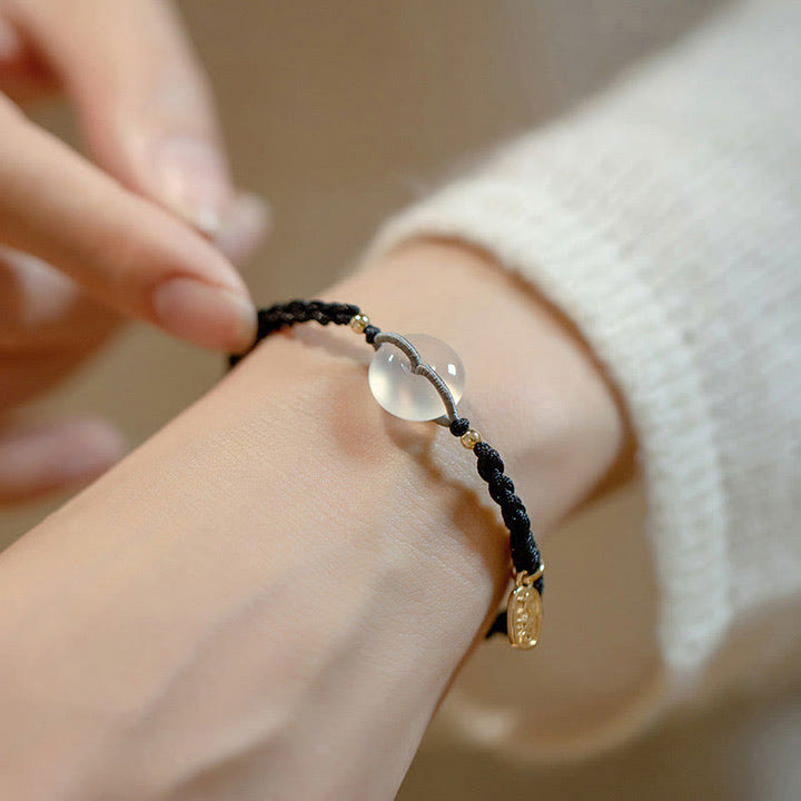 Bracelet en corde positive avec boucle ronde en calcédoine et Buddha Stones