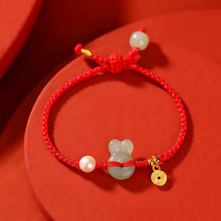 Bracelet en argent sterling 925 avec cordon rouge et pièce de cuivre en jade Hetian Année du lapin