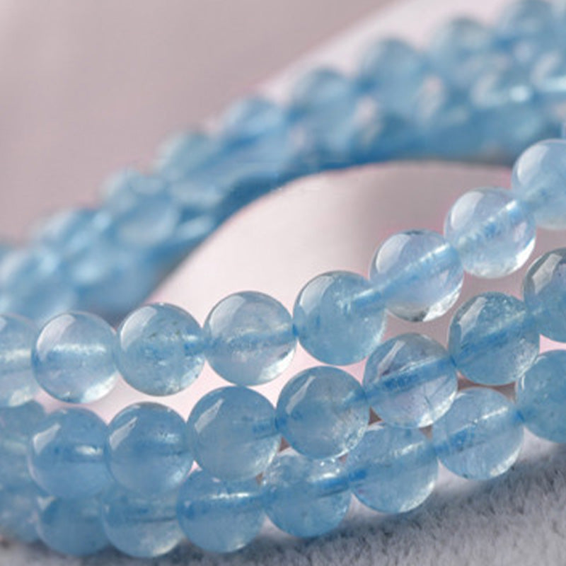 Bracelet de guérison de la paix en aigue-marine naturelle de Buddha Stones