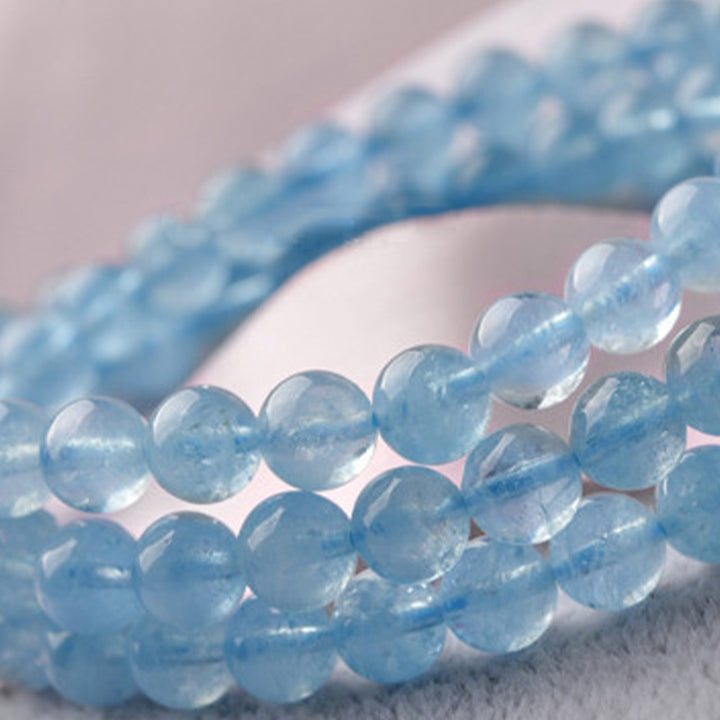 Bracelet de guérison de la paix en aigue-marine naturelle de Buddha Stones
