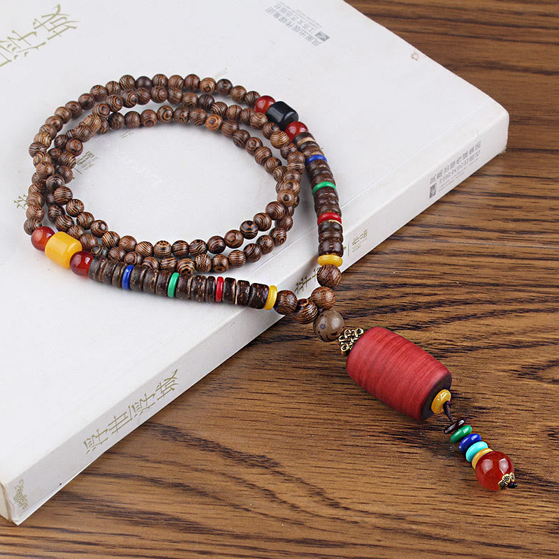 Collier pendentif en Buddha Stones tibétain en bois de wengé Bodhi Seed Agate Balance Peace