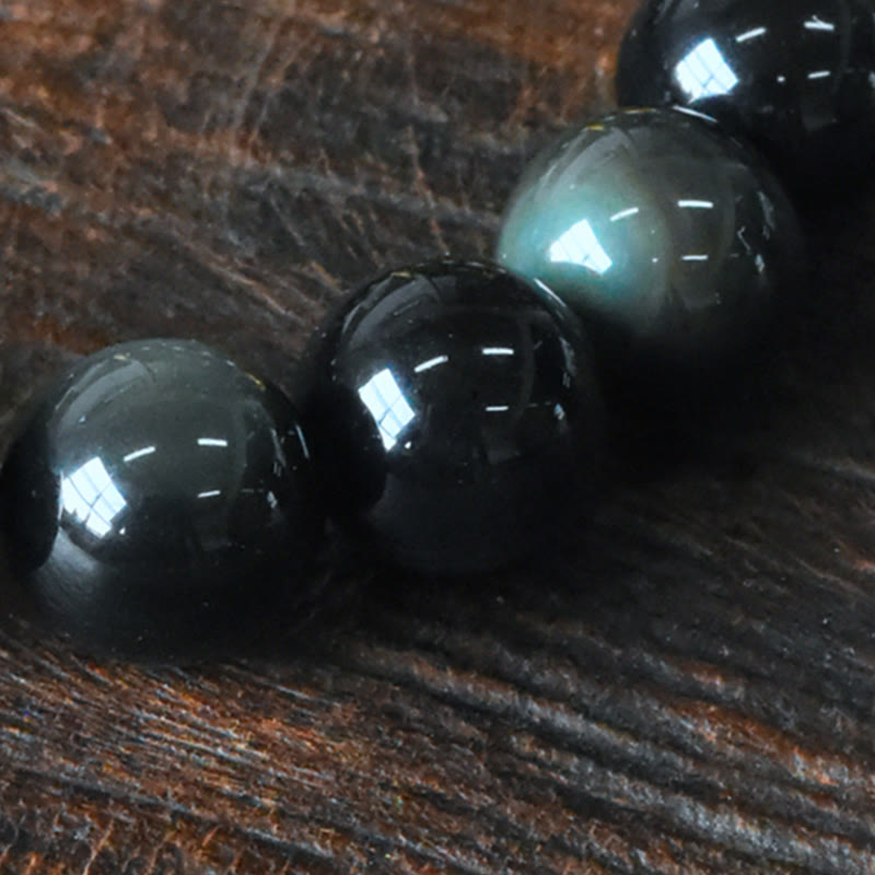 Bracelet de transformation positive en perles de cuivre et obsidienne arc-en Buddha Stones